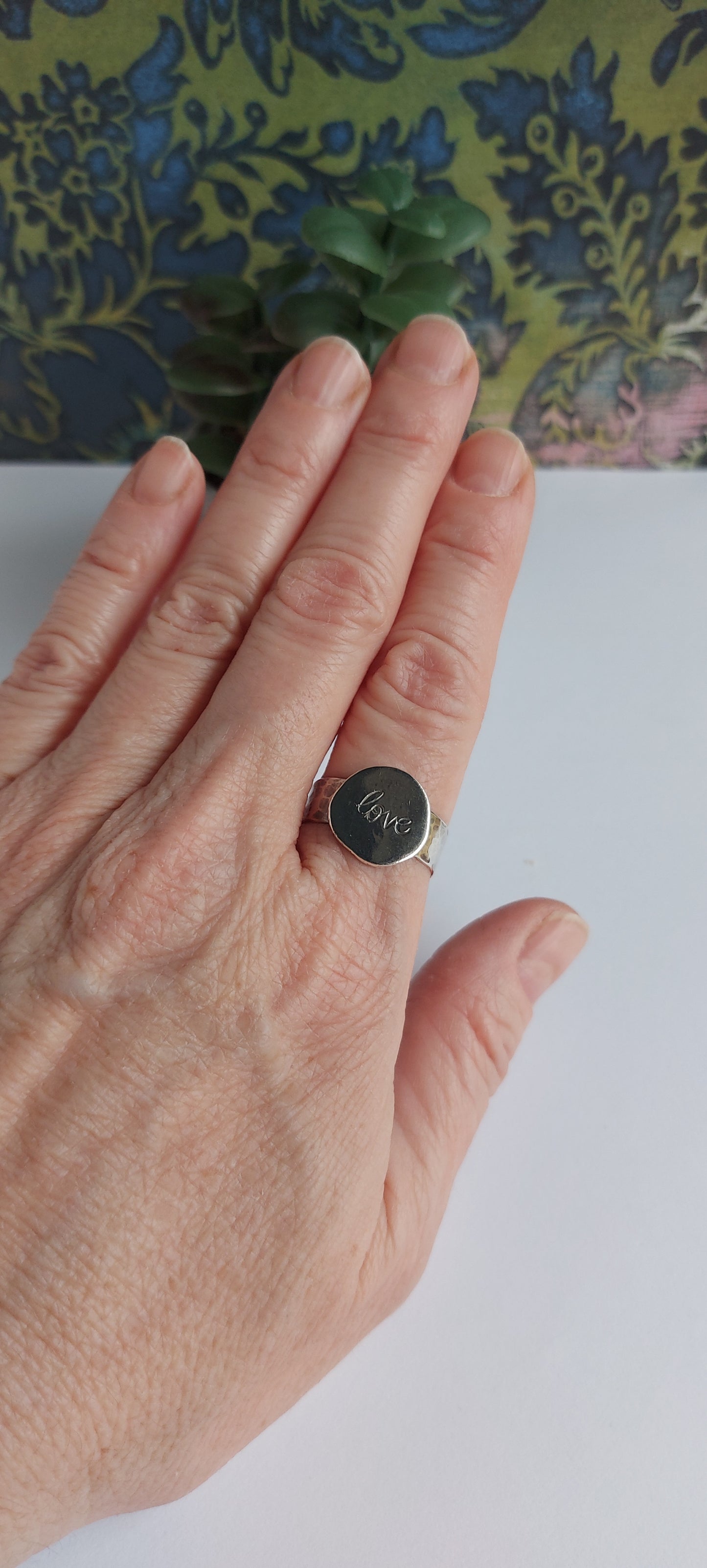 "Love" ring