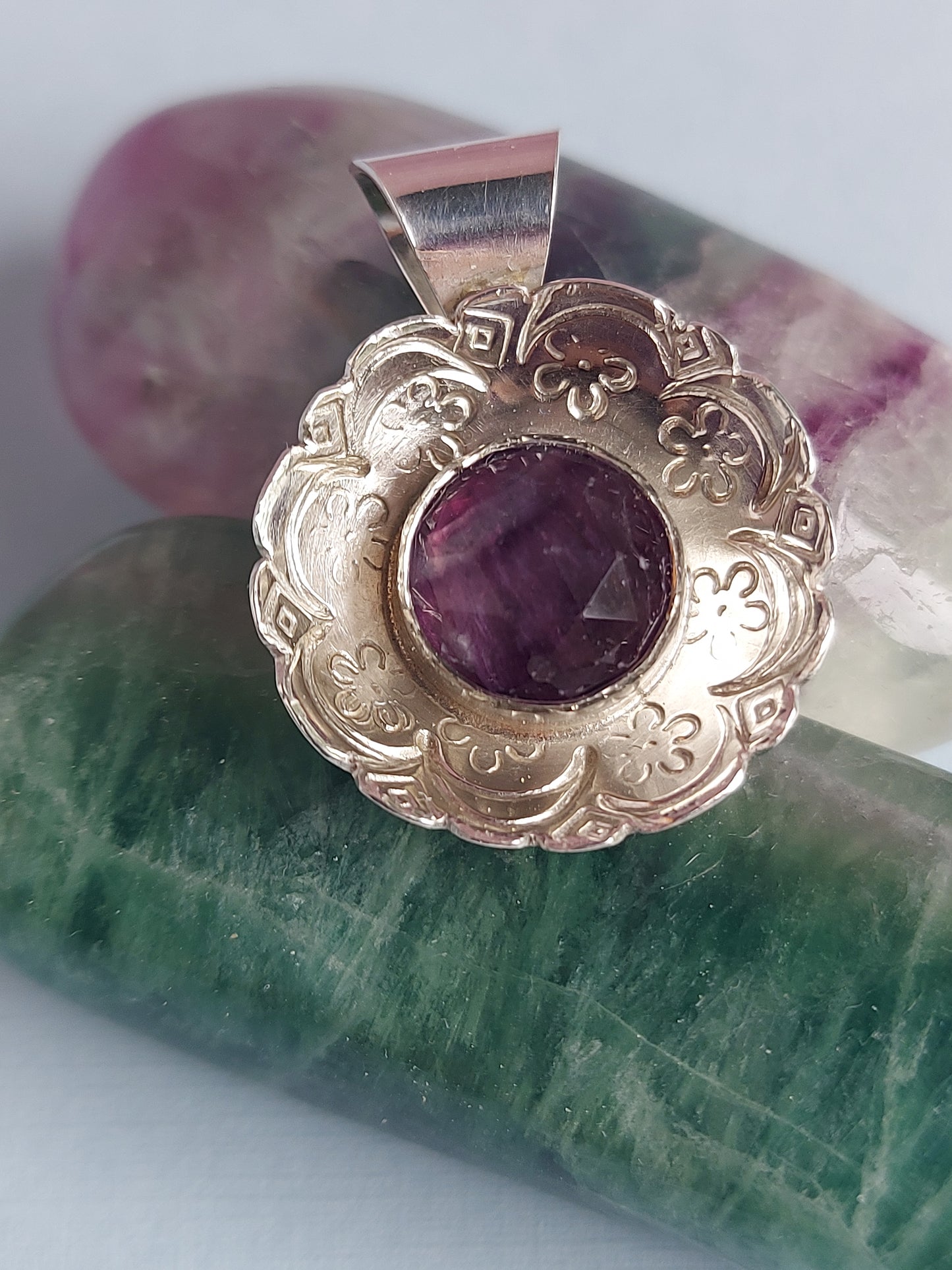 hand stamped fluorite mandala pendant