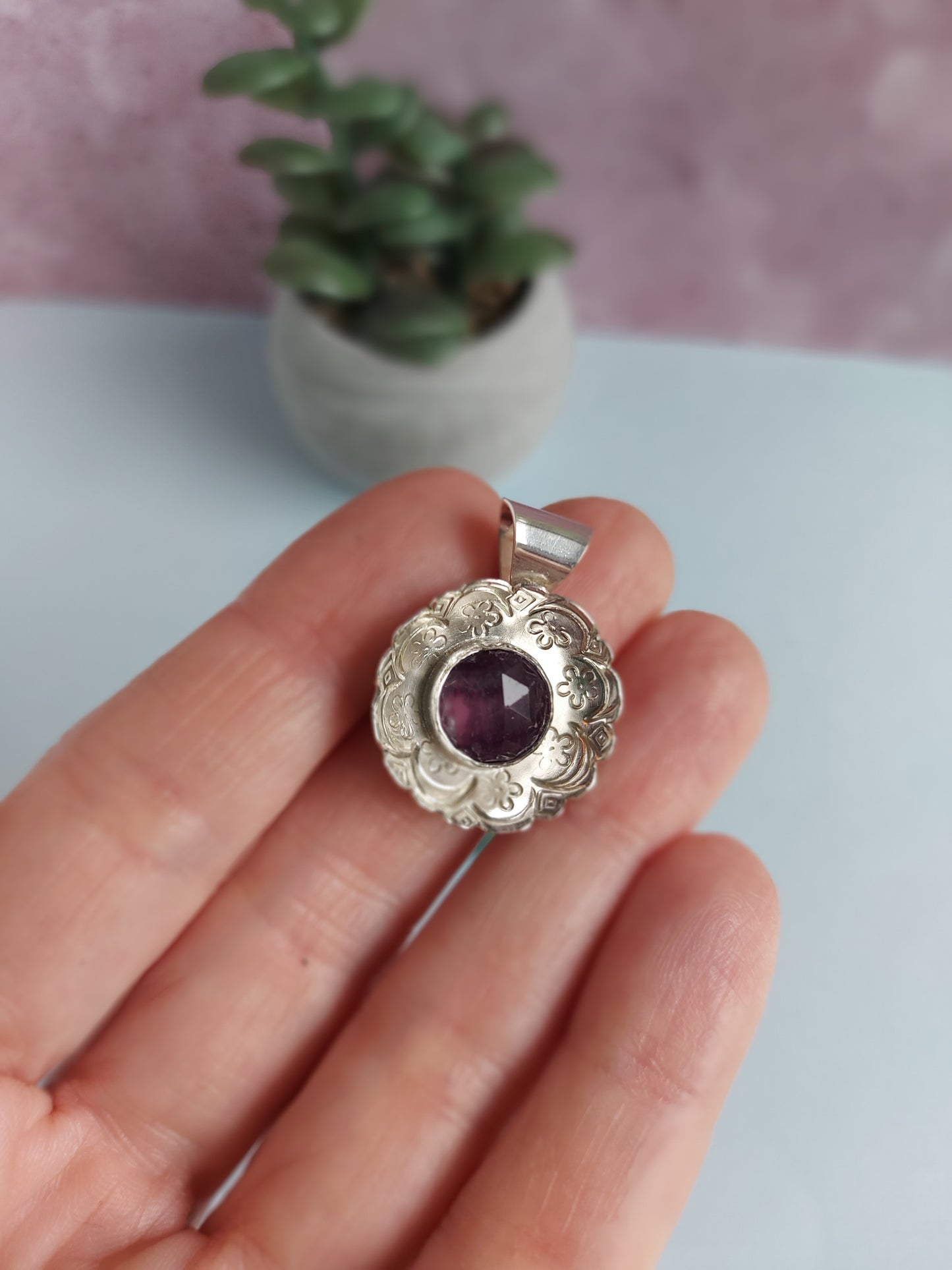 hand stamped fluorite mandala pendant