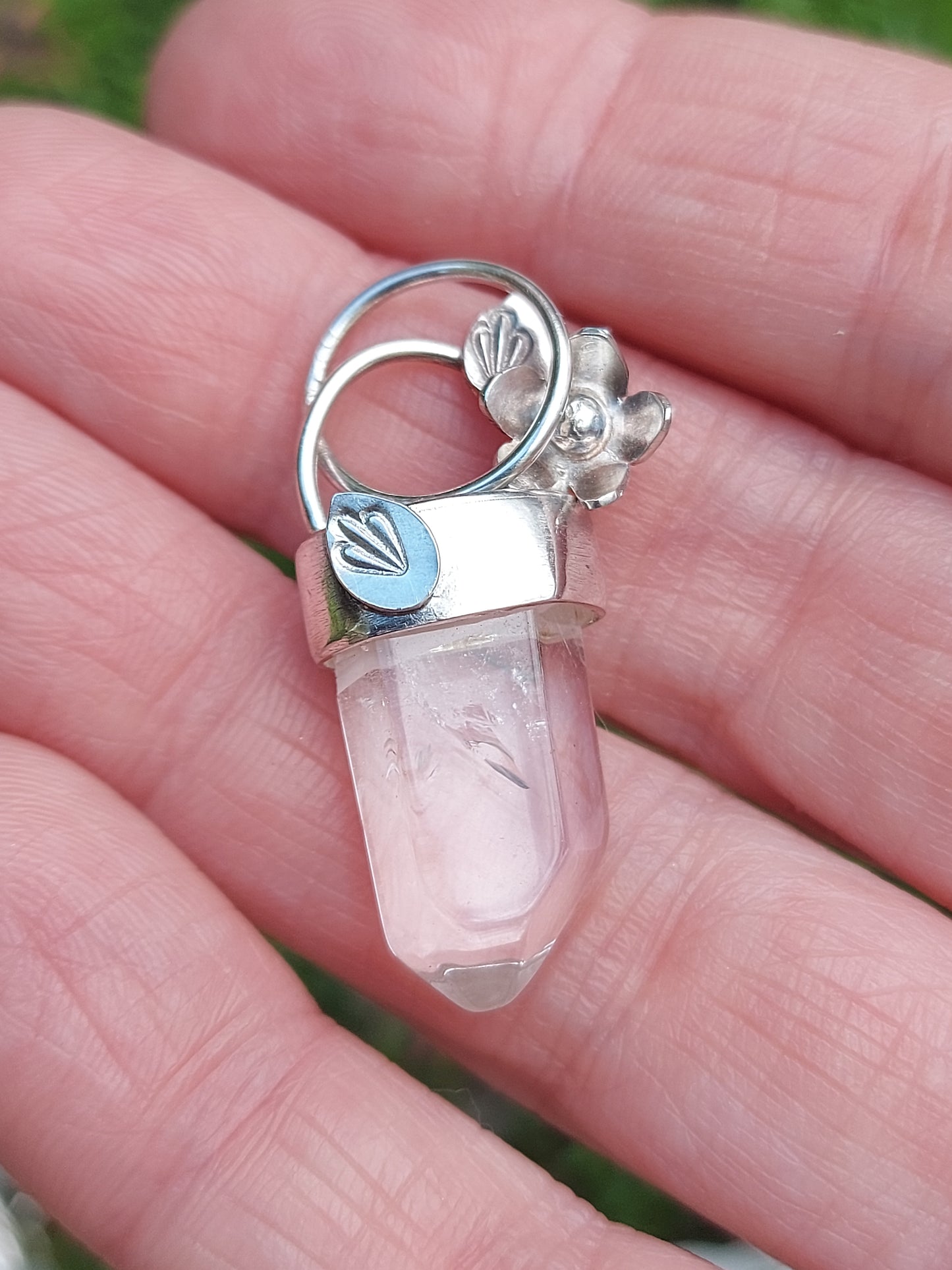 Clear quartz point with flower