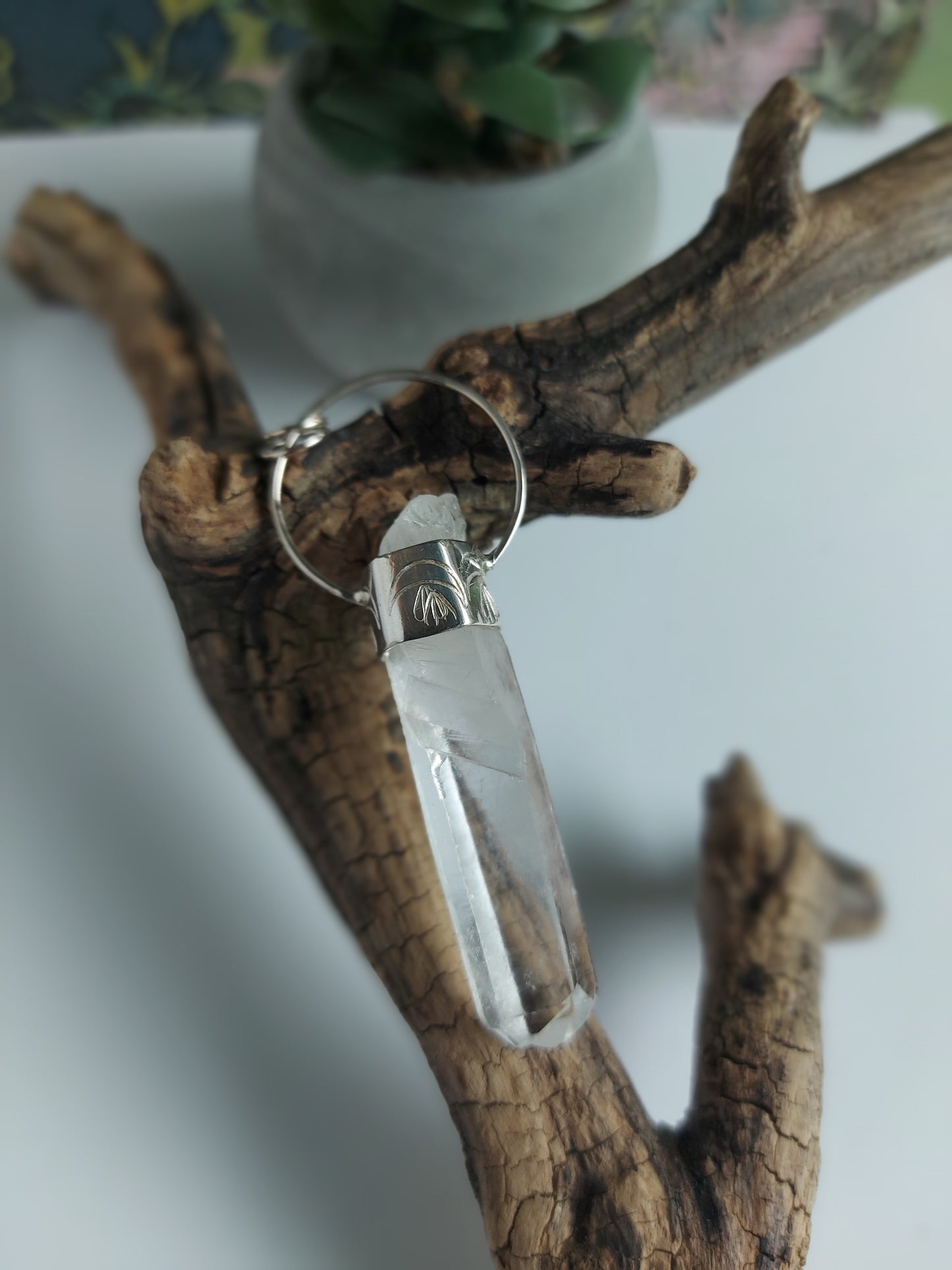 Raw quartz point silver pendant