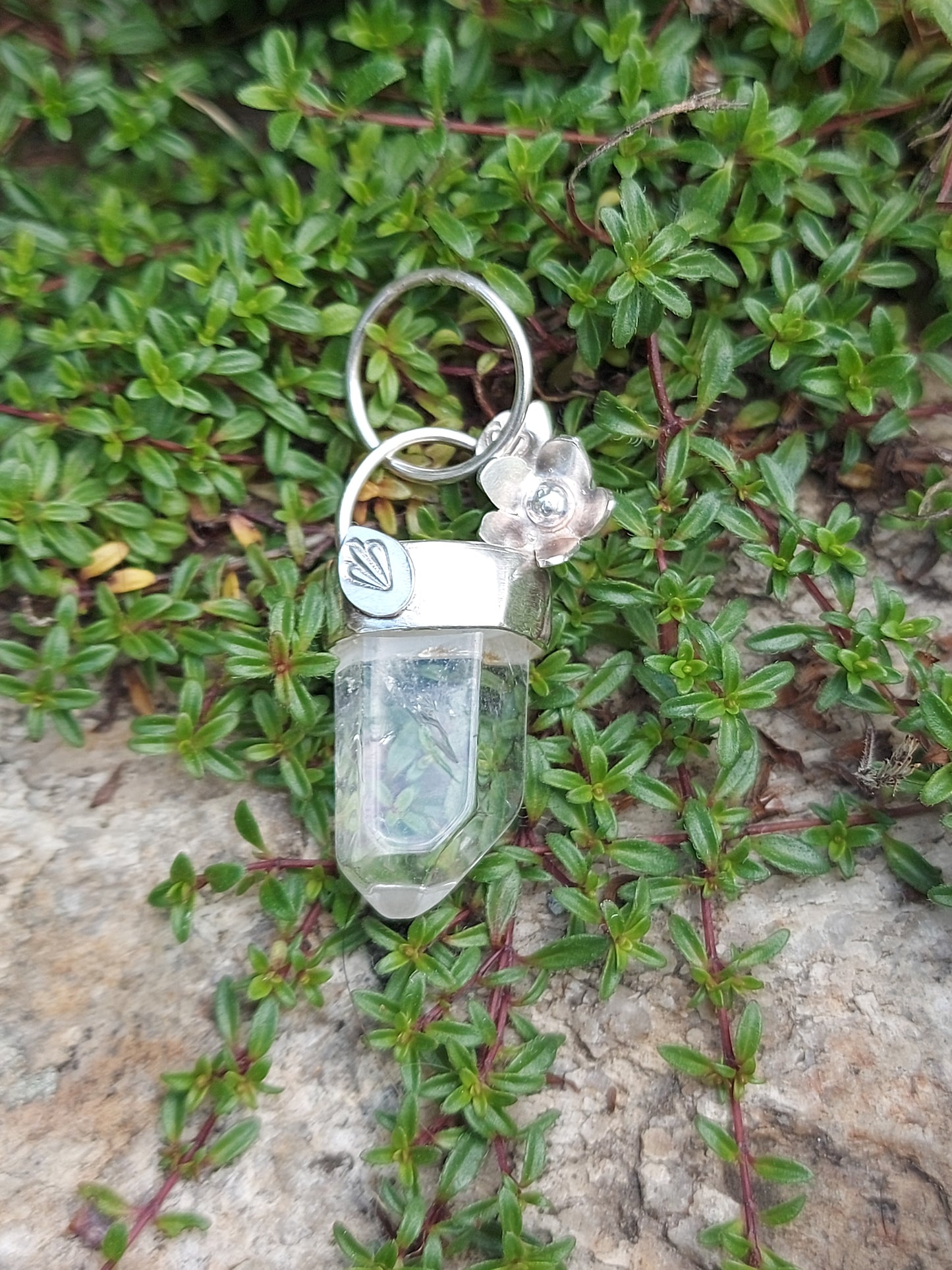 Clear quartz point with flower