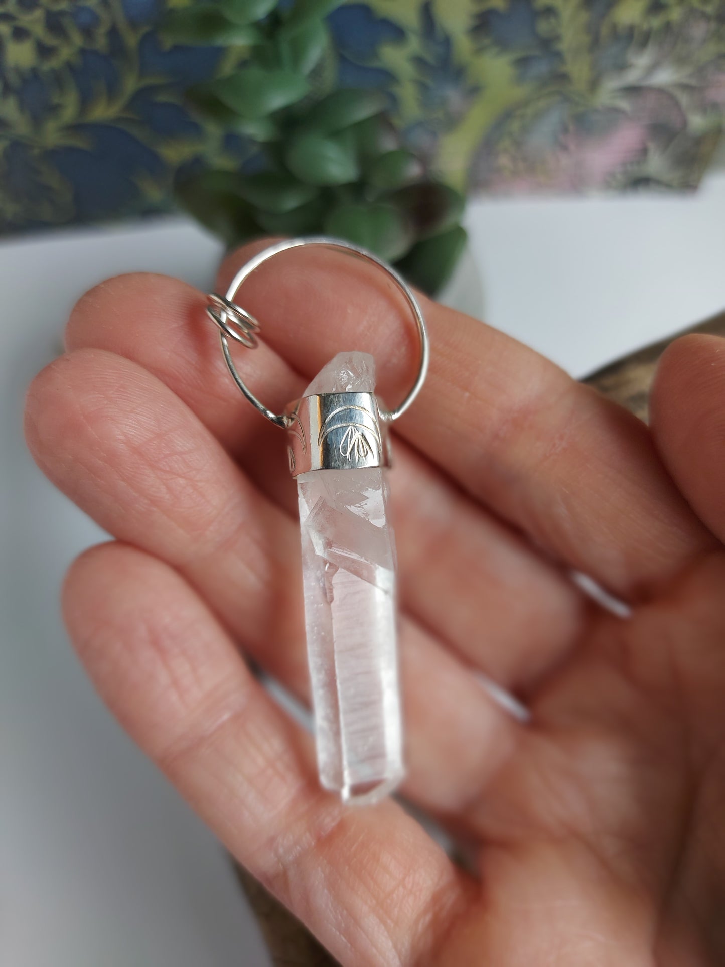 Raw quartz point silver pendant